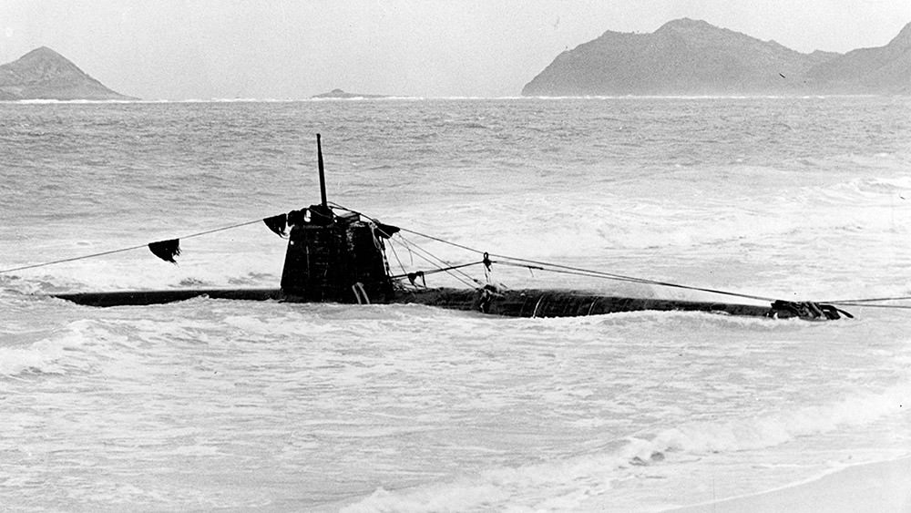 The Japanese mini submarine HA-19 (similar to the mini sub sunk by the USS Ward), which washed ashore on December 8, 1941. Photo courtesy of Naval History and Heritage Command.